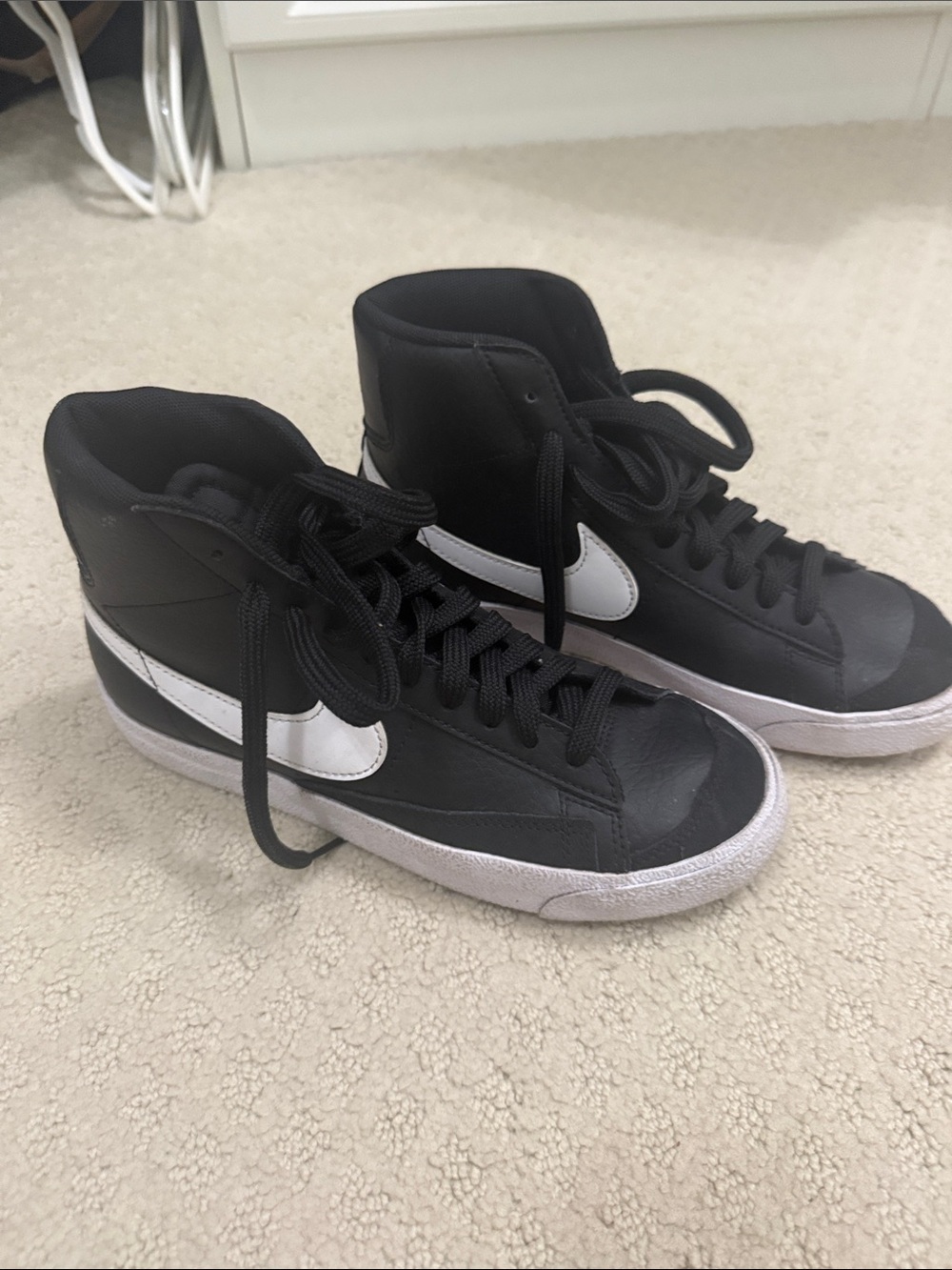 Nike Black and White Mid-Top Swoosh Sneakers